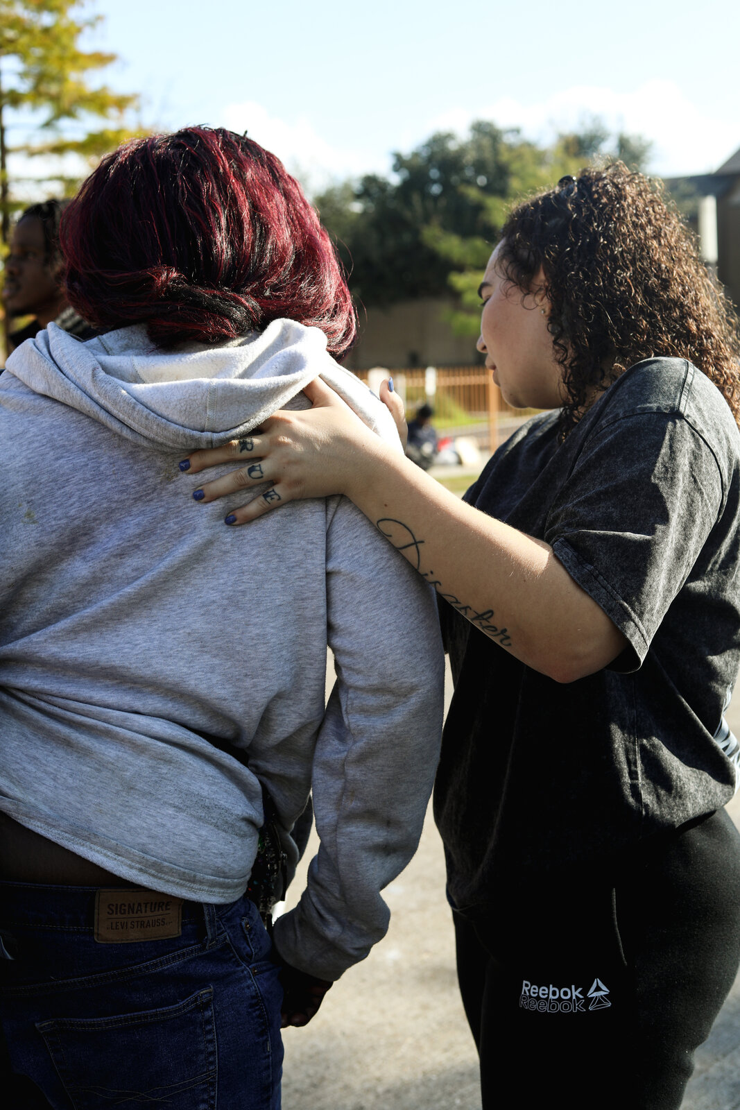 Praying with someone during a Go Ye outreach